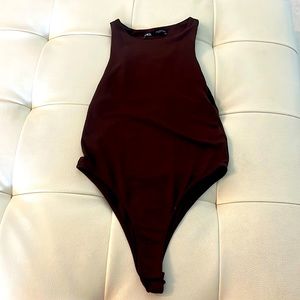 Brown body suit